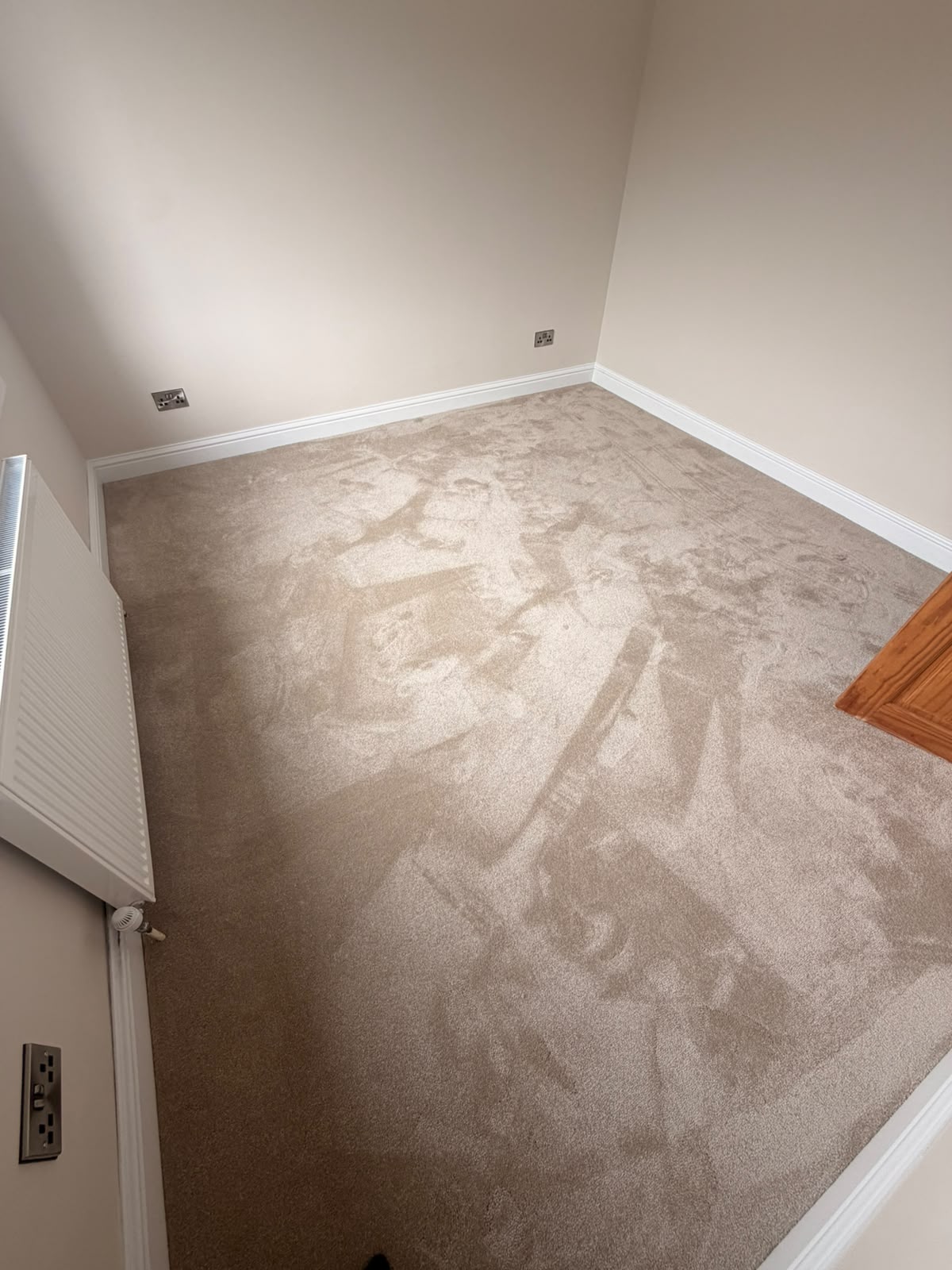 Taupe saxony carpet fitted wall to wall